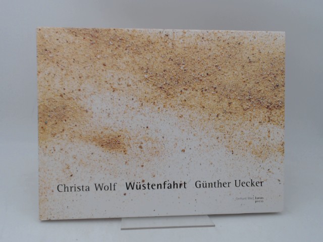 Wolf, Christa und Gnther Uecker:  Wstenfahrt. Erzhlung. Zur Erzhlung arbeitete Gnther Uecker 13 Materialbilder auf Holztafeln, deren Reproduktion dieses Buch bietet. 