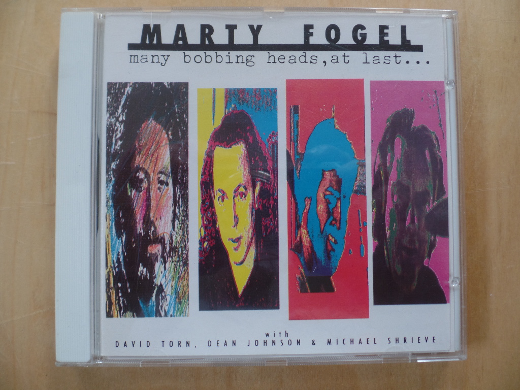 Fogel, Marty:  Many Bobbing Heads,at Last 