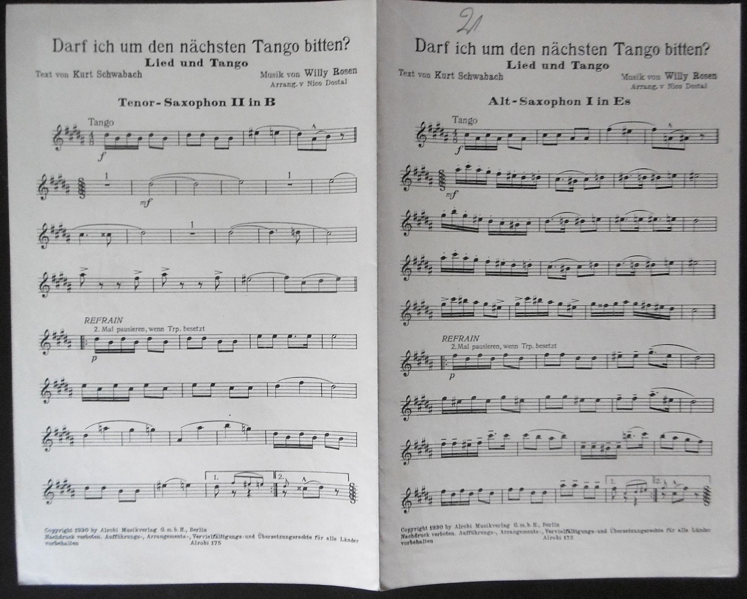Darf ich um den nächsten Tango bitten? Lied und Tango. Arrang. v. Nico Dostal. 2 Blätter Noten für Alt-Saxophon I in Es, Tenorsaxophon II in B und Schlagzeug, Banjo. - Schwabach, Kurt (Text) / Rosen, Willy (Musik)