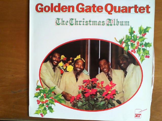 Golden Gate Quartet  - The Christmas Album. RTI-12-7. 12 Titel: Oh Christmas tree, Come all ye faithful, Deck the halls, White Christmas, Joseph's lullaby, A child is born in Bethlehem, Every year at Christmas, Go where I send thee, I shall be released, When was Jesus born, What are you doing New Year's Eve, The angel Gabriel. - Wilson, Orlandus u.a.